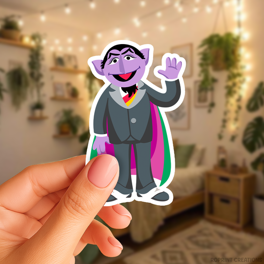 Make counting fun with this playful Count Von Count sticker! Perfect for party favors, crafts, or decorating notebooks, Laptops, and more — the best gift for Sesame Street fans.