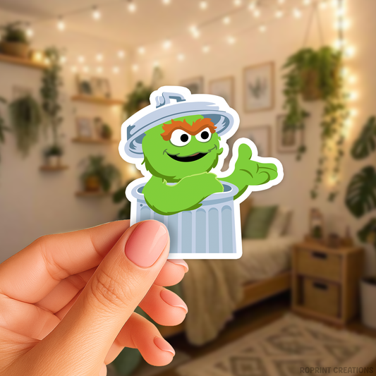 Add some fun with this Oscar sticker! Perfect for party favors, crafts, or decorating notebooks, laptops, and more — the best gift for Sesame Street fans.