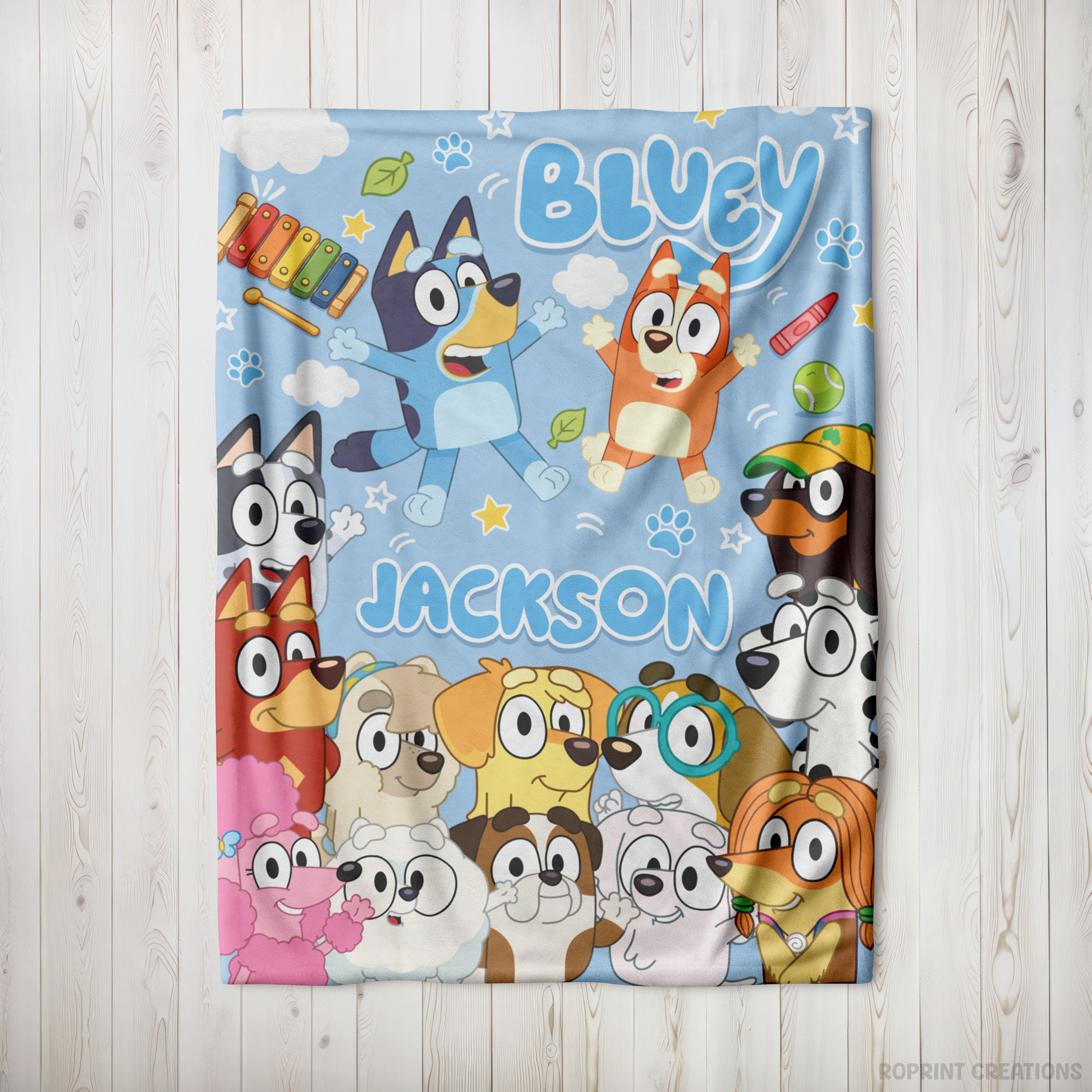 Snuggle up with this personalized Bluey-inspired plush blanket! Customize it with a name to create a soft velveteen throw that's perfect for naps, bedtime, movie nights, and everyday cuddles. A thoughtful gift for kids who love Bluey-inspired designs.