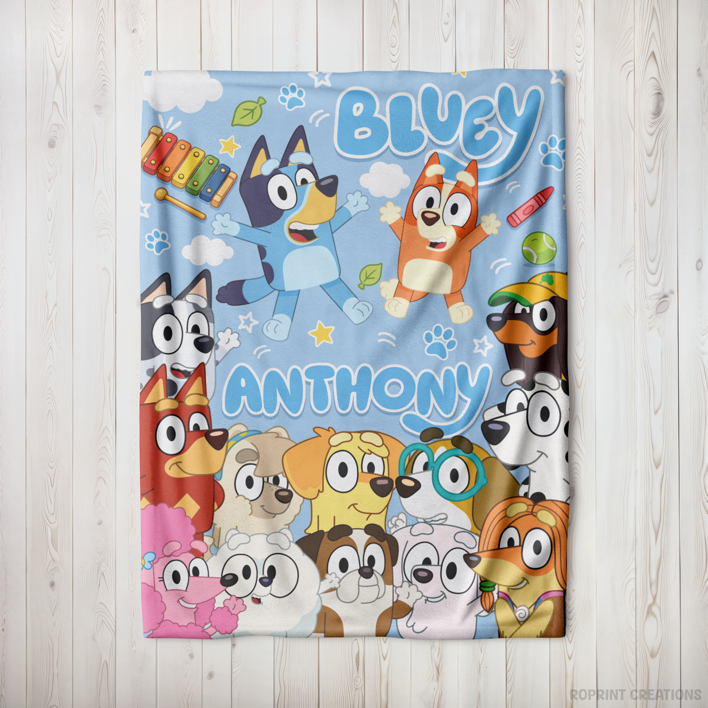 Snuggle up with this personalized Bluey-inspired plush blanket! Customize it with a name to create a soft velveteen throw that's perfect for naps, bedtime, movie nights, and everyday cuddles. A thoughtful gift for kids who love Bluey-inspired designs.