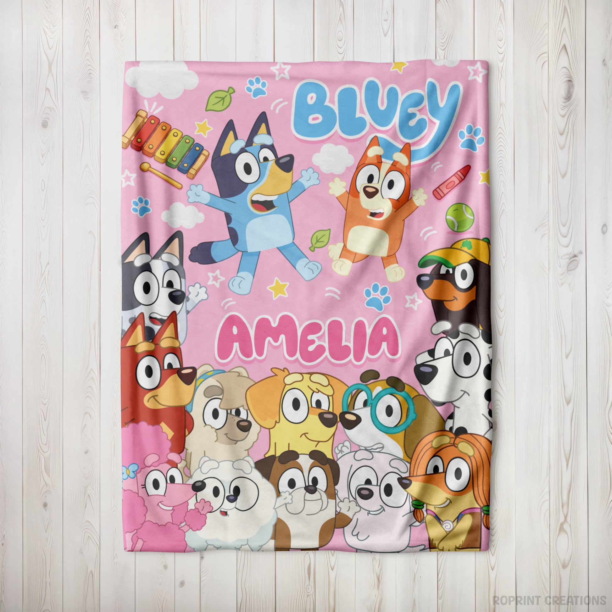 Snuggle up with this Pink personalized Bluey-inspired plush blanket! Customize it with a name to create a soft velveteen throw that's perfect for naps, bedtime, movie nights, and everyday cuddles. A thoughtful gift for kids who love Bluey-inspired designs.