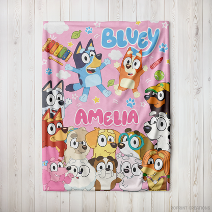 Snuggle up with this Pink personalized Bluey-inspired plush blanket! Customize it with a name to create a soft velveteen throw that's perfect for naps, bedtime, movie nights, and everyday cuddles. A thoughtful gift for kids who love Bluey-inspired designs.