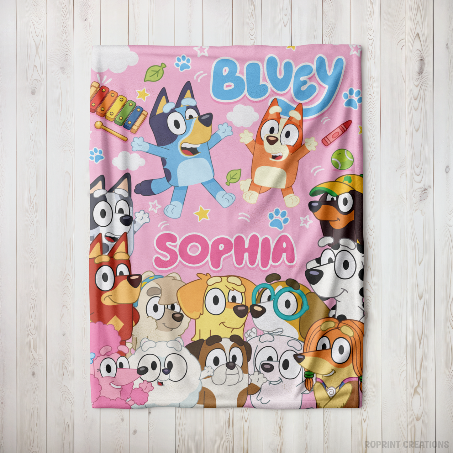 Snuggle up with this Pink personalized Bluey-inspired plush blanket! Customize it with a name to create a soft velveteen throw that's perfect for naps, bedtime, movie nights, and everyday cuddles. A thoughtful gift for kids who love Bluey-inspired designs.