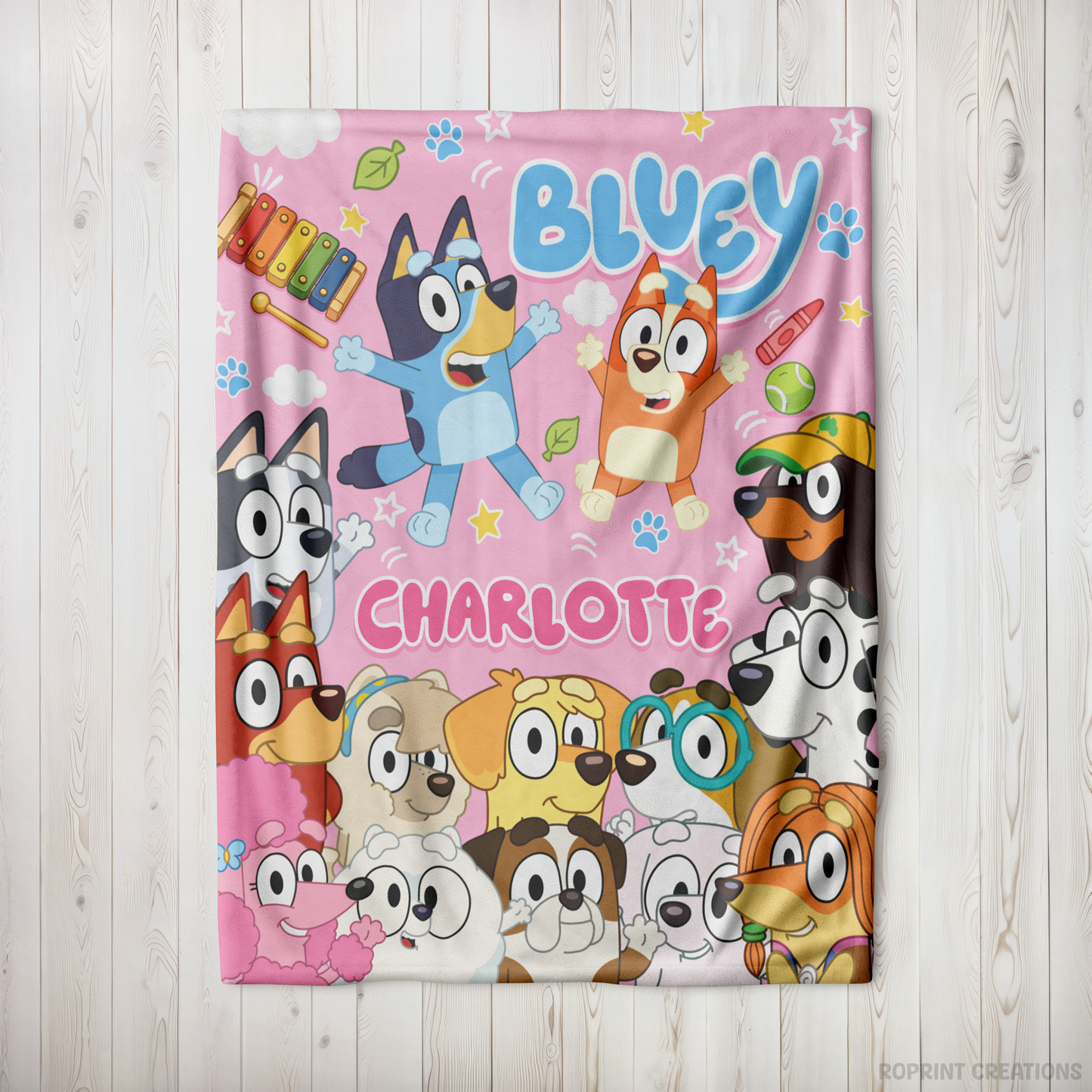 Snuggle up with this Pink personalized Bluey-inspired plush blanket! Customize it with a name to create a soft velveteen throw that's perfect for naps, bedtime, movie nights, and everyday cuddles. A thoughtful gift for kids who love Bluey-inspired designs.