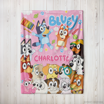 Snuggle up with this Pink personalized Bluey-inspired plush blanket! Customize it with a name to create a soft velveteen throw that's perfect for naps, bedtime, movie nights, and everyday cuddles. A thoughtful gift for kids who love Bluey-inspired designs.