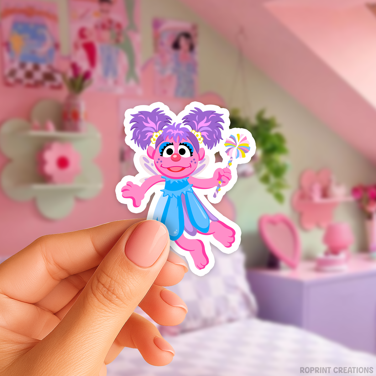 Add some fun with this Abby sticker! Perfect for party favors, crafts, or decorating notebooks, laptops, and more — the best gift for Sesame Street fans.