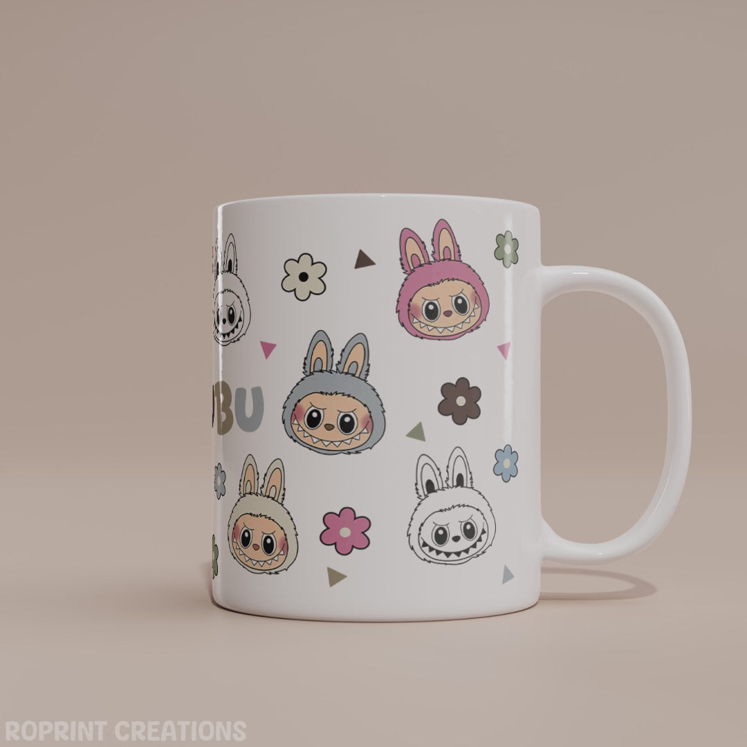 Labubu Mug - Cute Monsters Labubu Coffee Mug Gift for POP MART Fans! This Labubu Mug features an adorable design inspired by The Monsters series from POP MART. Perfect for collectors and fans alike, this cute and quirky coffee cup brings a splash of character to your morning routine. Whether you're a toy lover, Labubu fan, or just into fun mugs, this makes the perfect gift or collectible for your shelf.
